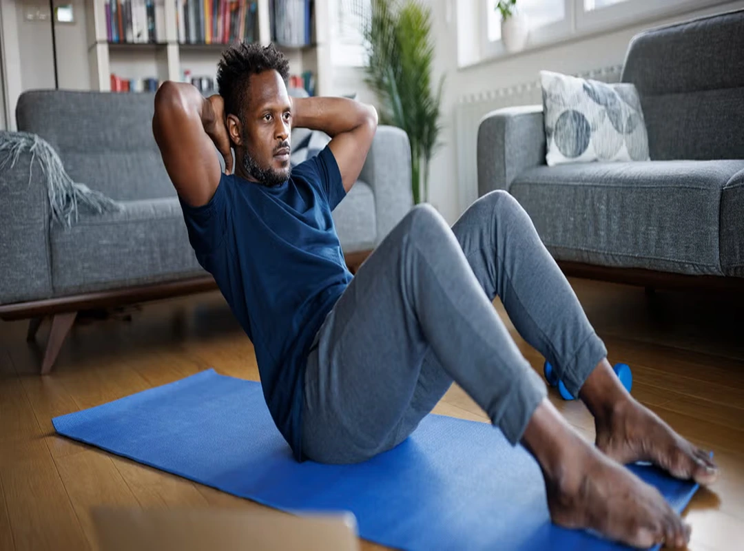 a young man doing home workout